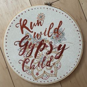 Embroidered wall hanging